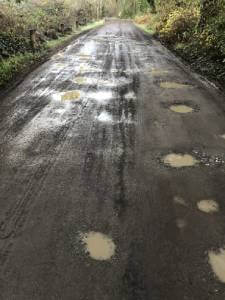 Gravel Access Road Pothole Repair BEFORE